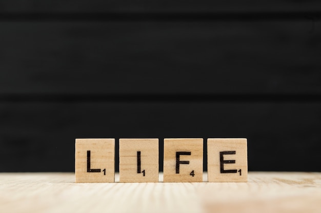 The word life spelt with wooden letters