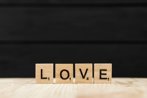 Free Photo the word love spelt with wooden letters