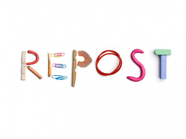 The word repost created from office stationery.