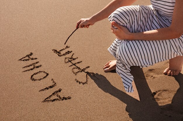 Free photo words in the sand about summer