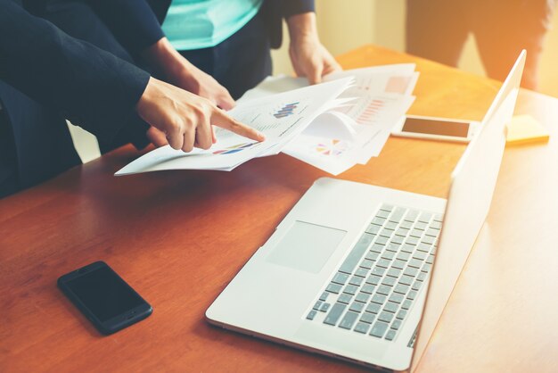 Workers comparing results documents