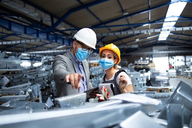 Workers in uniforms protecting against corona virus