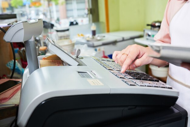 Working at cash desk