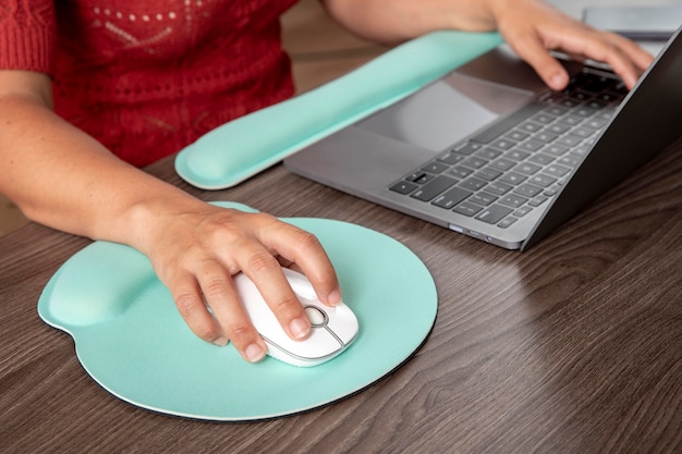 Free photo working from home in ergonomic workstation