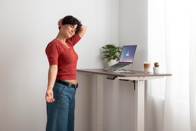 Free photo working from home in ergonomic workstation