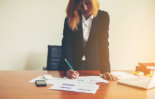 Working woman standing in graphics