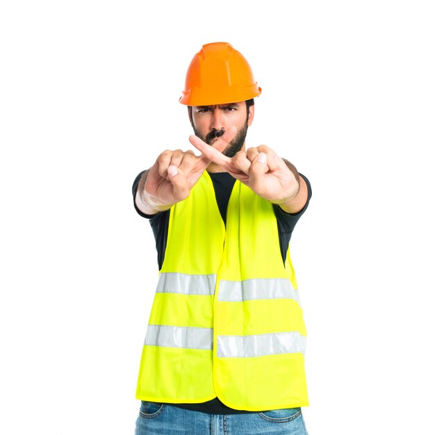 Workman doing NO gesture over white background