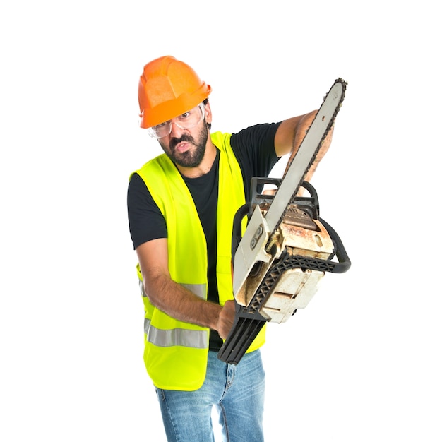 Free photo workman with chainsaw over white background