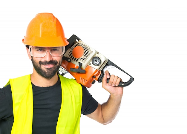 Free photo workman with chainsaw over white background