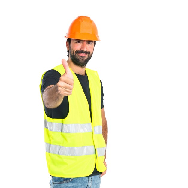 Workman with thumb up over white background