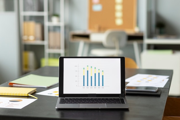 Free Photo workplace arrangement with laptop on desk