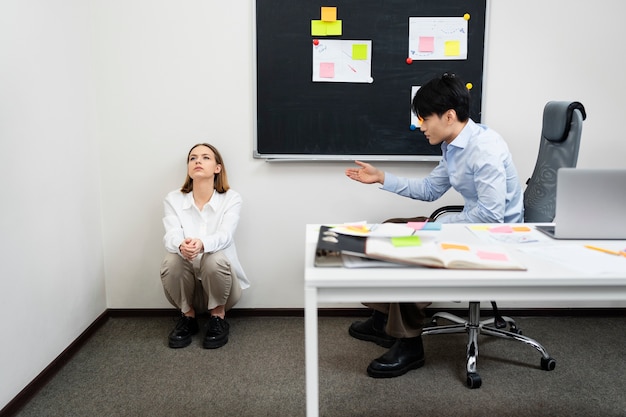 Free Photo workplace violence taking place between colleagues