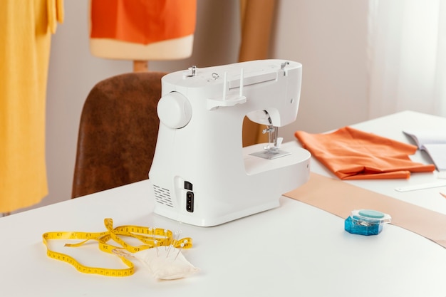 Free photo workspace concept with sewing machine