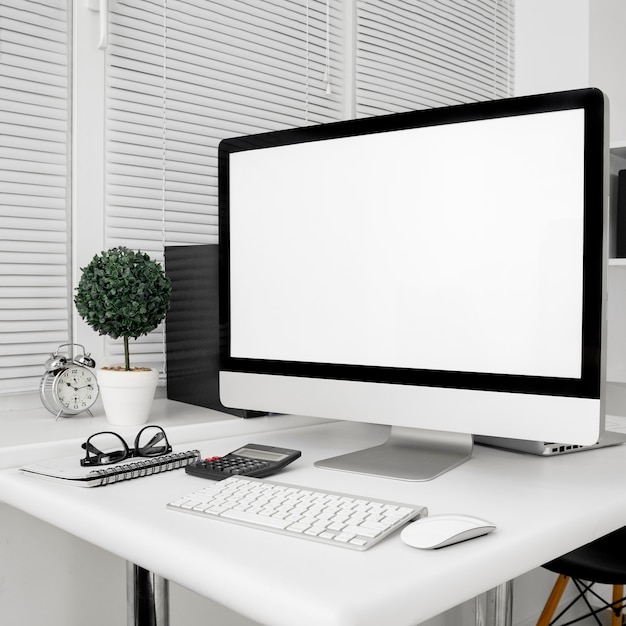 Workspace with computer screen and keyboard