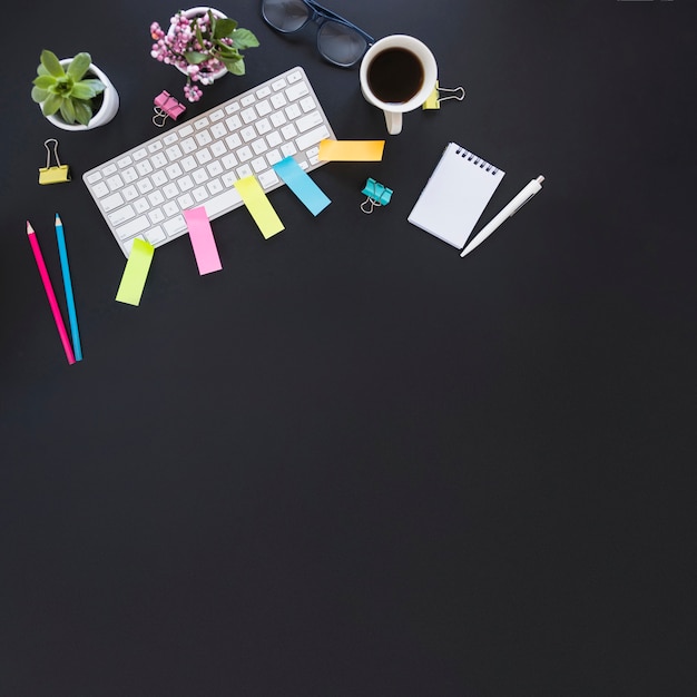 Workspace with keypad cup plants and stationary