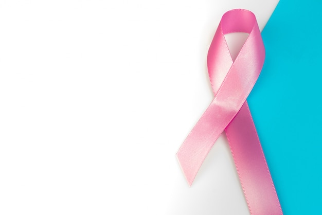 Free Photo world cancer day : breast cancer awareness ribbon on white backg