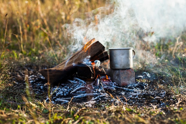 Free photo worming up drink process on fire