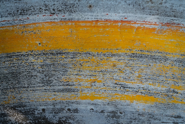 Worn yellow paint