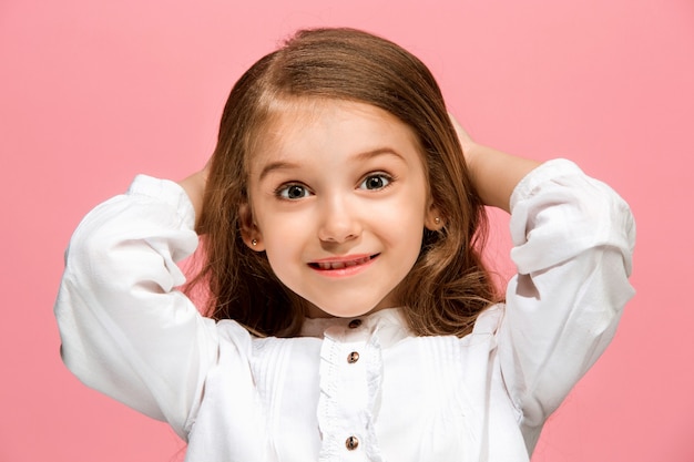 Wow. Beautiful female front portrait isolated on pink studio