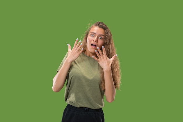 Wow. Beautiful female half-length front portrait isolated on green studio