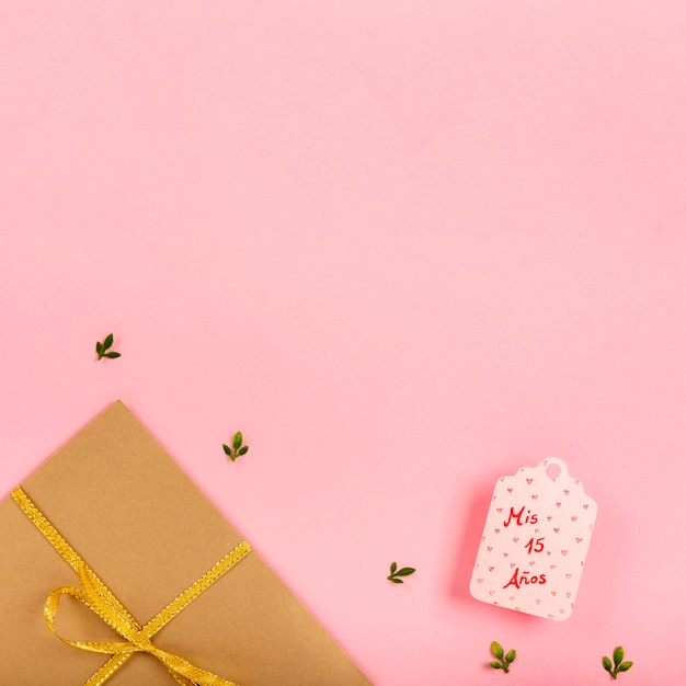 Wrapped gifts on pink background with copy space