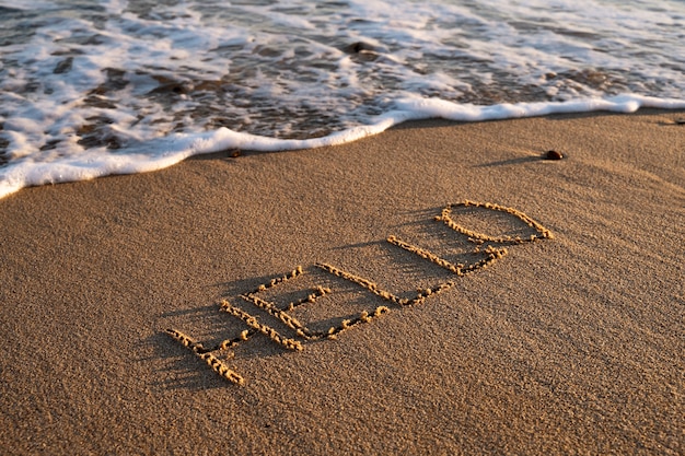 Writing words in the sand