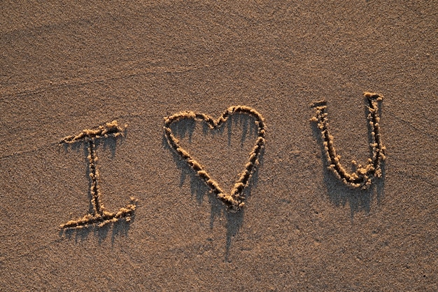 Free photo writing words in the sand