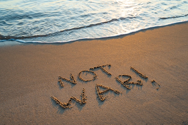 Free photo writing words in the sand