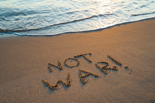 Writing words in the sand