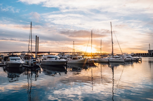 Free Photo yacht reflection sunset harbour