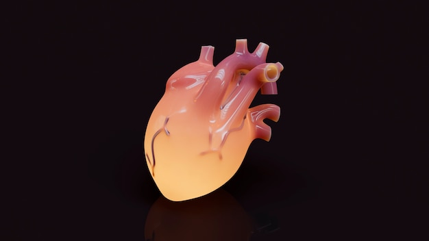 Yellow anatomical heart with brown  background