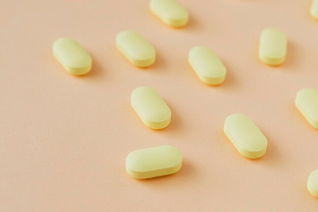 Yellow antibiotics on a beige background