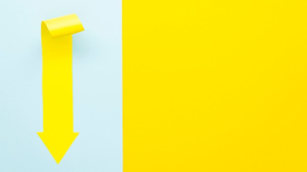 Free photo yellow arrow with copy space