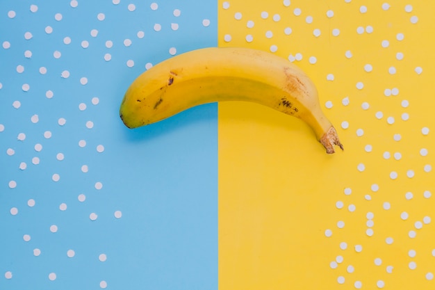 Yellow banana in conceptual composition