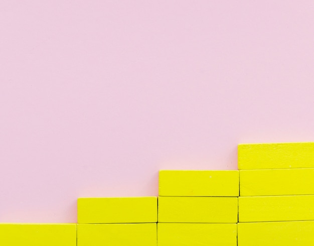 Free photo yellow blocks creating stairs