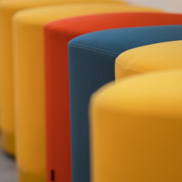 Free photo yellow blue and red chairs