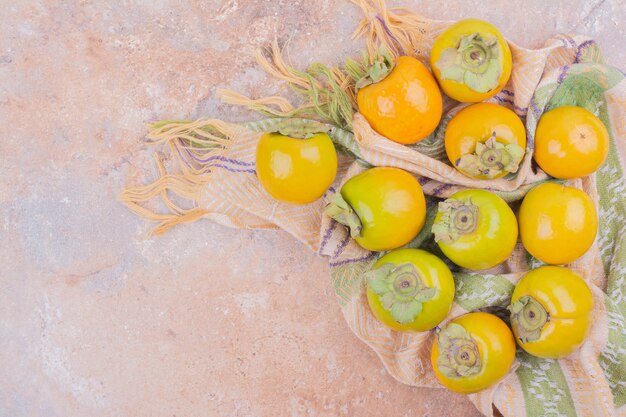 Yellow bright plum dates on pink.