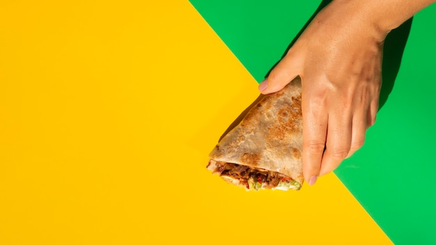 Free Photo yellow copy space background and delicious mexican taco