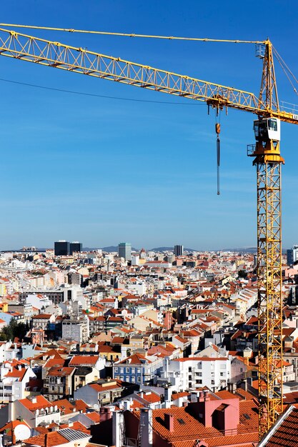 Yellow crane on building site in Lisboa