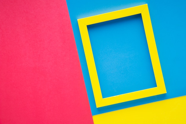 Free Photo yellow frame on colorful background