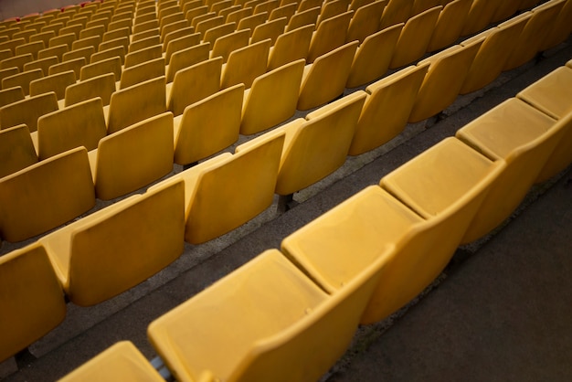 Yellow grandstands rows high angle