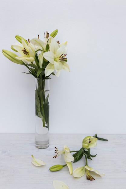 Free photo yellow lilies in vase