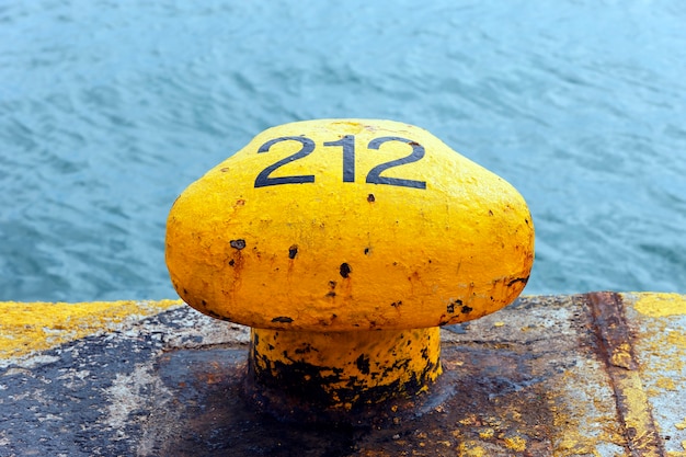 Yellow mooring at the port