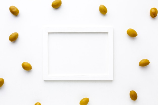 Yellow olives with white frame mock-up