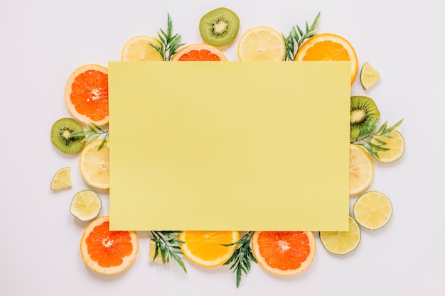 Free photo yellow paper sheet of ripe fruits