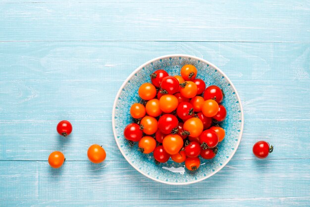 Yellow and red cherry tomatoes.