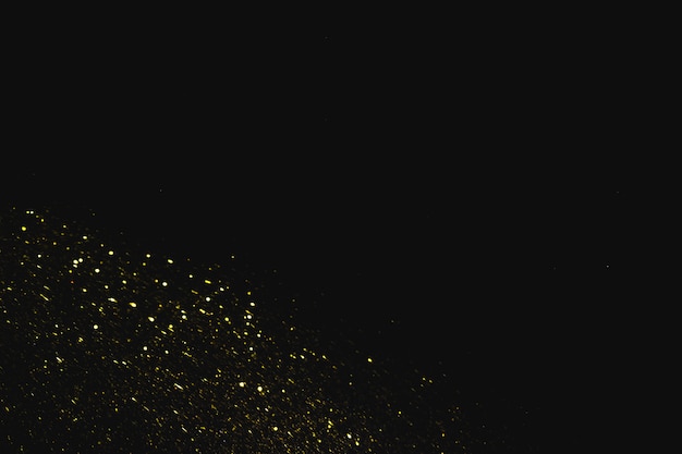 Yellow sequins on dark background