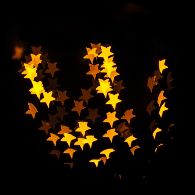 Free photo yellow star-shaped lights