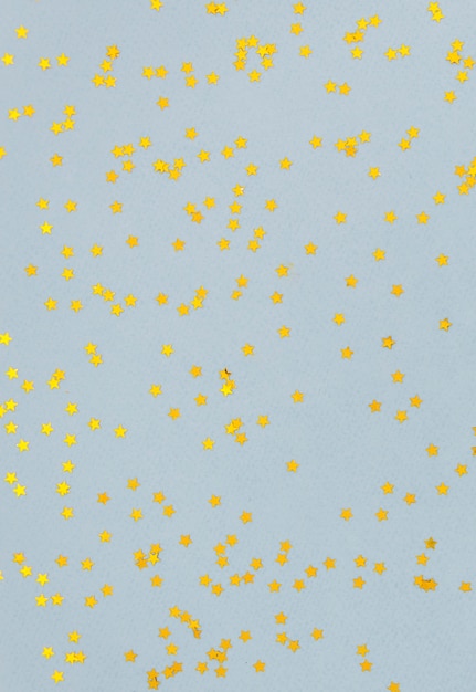 Free photo yellow stars on blue background