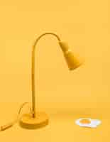 Free photo yellow still life of egg under lamp